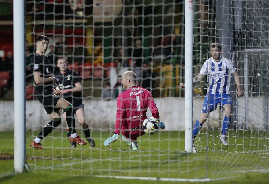 Coleraine marksman Jamie McGonigle fires beyond Glentoran goalkeeper Aaron McCarey during the Bannsiders' European Play-Off Semi-Final victory