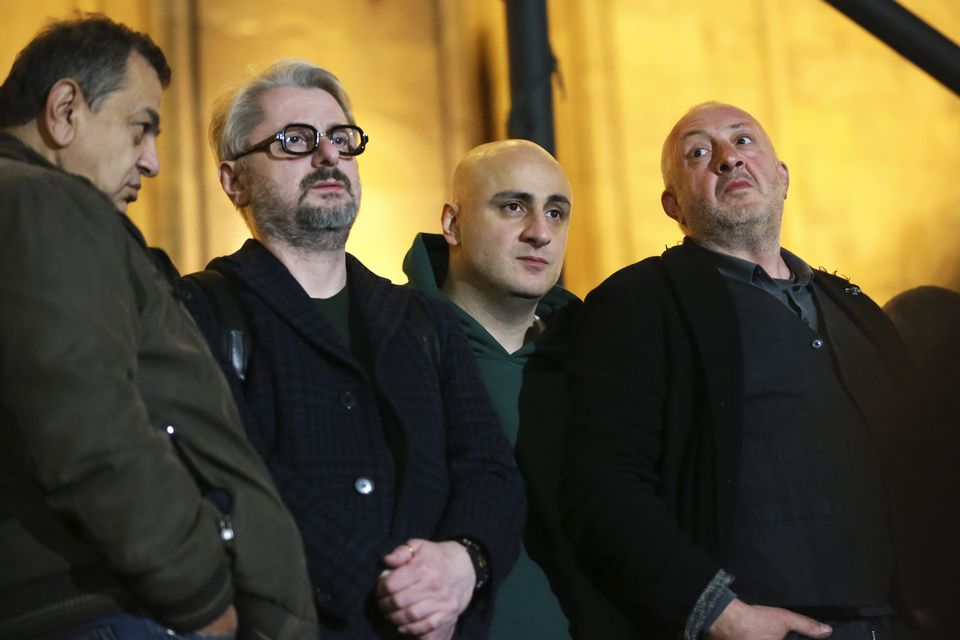 Opposition figure David Berdzenishvii, leaders of Strong Georgia Coalition Nika Gvaramia and Nika Melia, and former president of Georgia Giorgi Margvelashvili attend the protest (Zurab Tsertsvadze/AP)