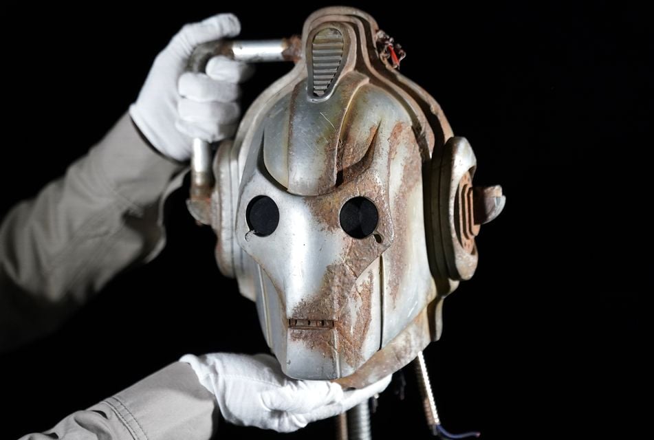 The auction also features a Cyberman’s head (Andrew Matthews/PA)