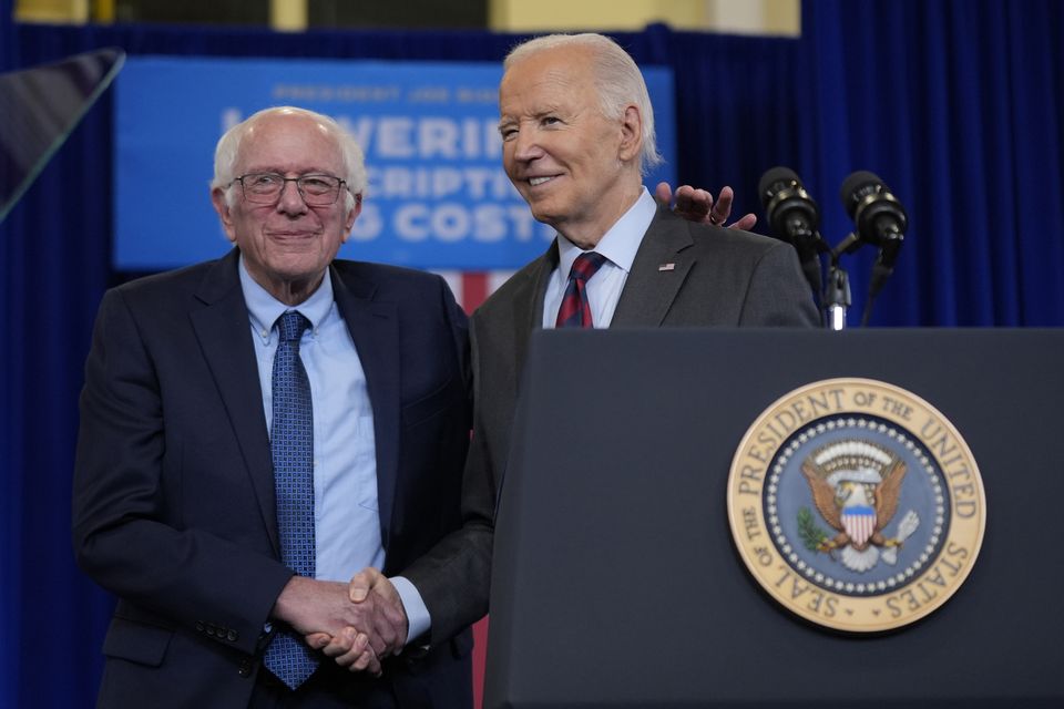 US President Joe Biden and Senator Bernie Sanders campaigning in October in New Hampshire (Manuel Balce Ceneta/AP)