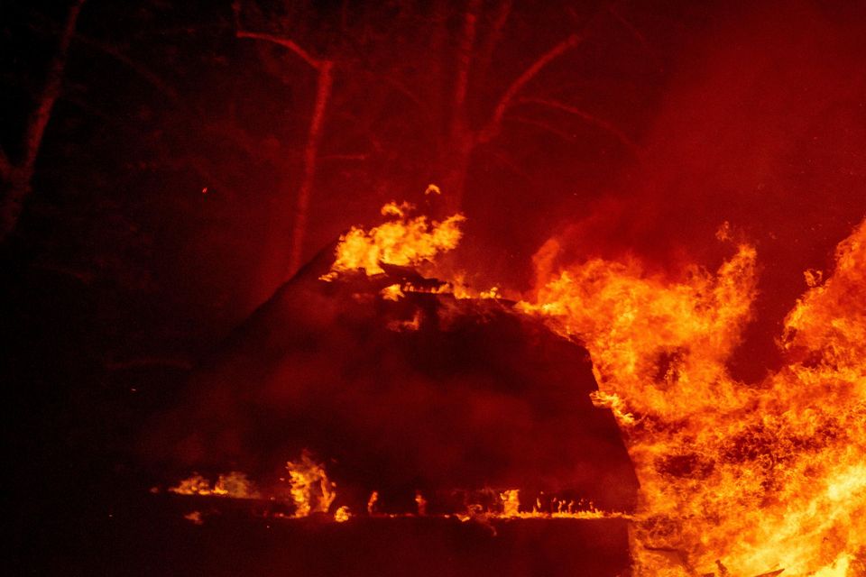 Homes have been burned by the Eaton fire in Altadena, California (AP)