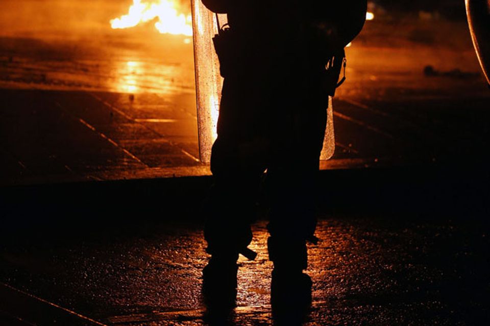 A car burns in the Castlereagh Street of east Belfast
