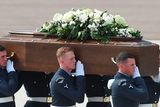 thumbnail: BRIZE NORTON, ENGLAND - JULY 01:  The coffin of John Stollery, one of the victims of last Friday's terrorist attack, is taken from the RAF C-17 aircraft at RAF Brize Norton in Tunisia, on July 1, 2015 in Brize Norton, England. British nationals Adrian Evans, Charles Evans, Joel Richards, Carly Lovett, Stephen Mellor, John Stollery, and Denis and Elaine Thwaites are the first of the victims of last week's terror attack to be repatriated.  (Photo by Joe Giddens-WPA Pool/Getty Images)