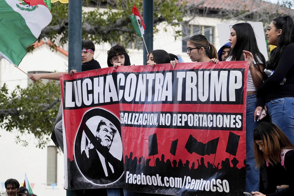 Demonstrators rally for immigration reform in Los Angeles (AP/Damian Dovarganes)