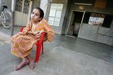 thumbnail: Inas Hamed who suffers from a birth defect is pictured on November 12, 2009 at her house in the city of Falluja west of Baghdad, Iraq