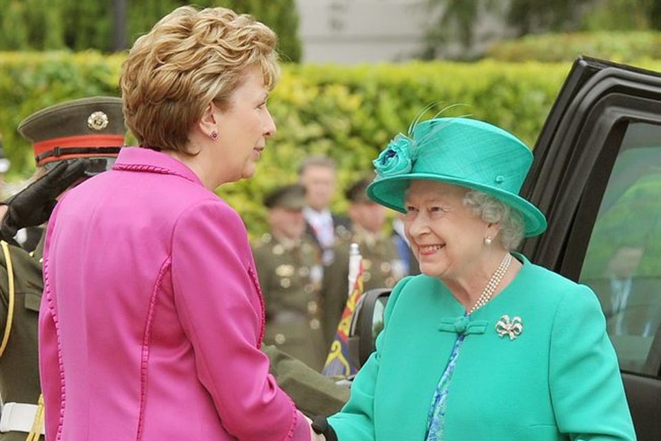 The Queen  shakes hands with Irish President Mary McAleese after arriving at Aras an Uachtarain (The Irish President's official residence) in Phoenix Park, Dublin, Ireland.