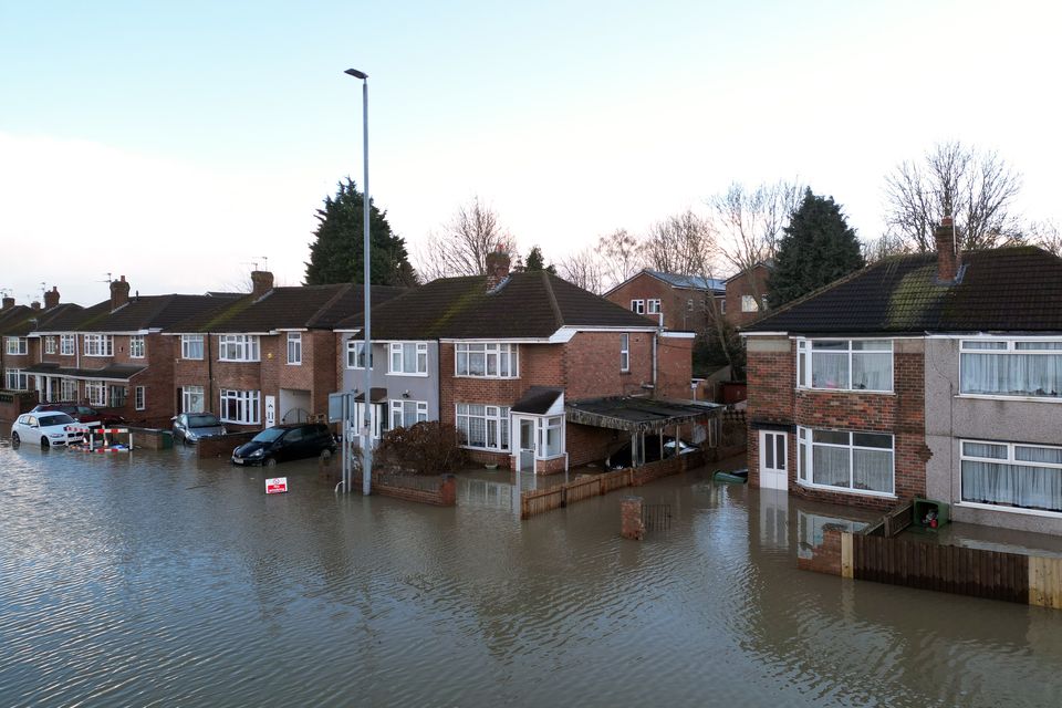 Houses in flood water in Loughborough, Leicestershire, in January (Joe Giddens/PA)