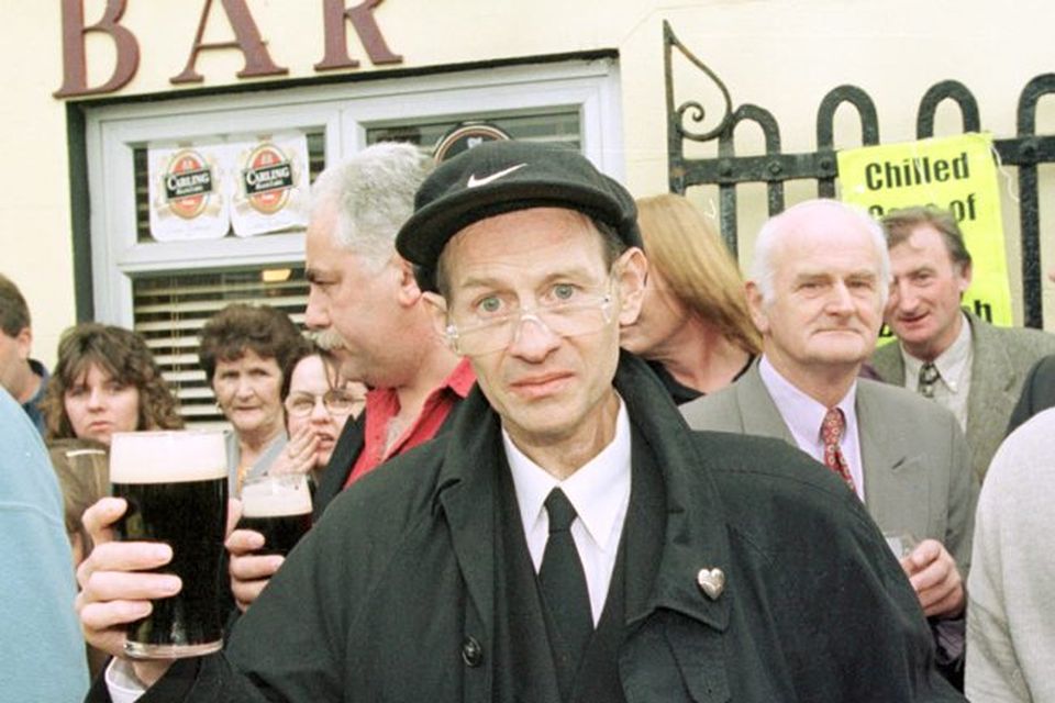 Alex Higgins   in 1999 at his friend Ollie Reed's funeral in County Cork