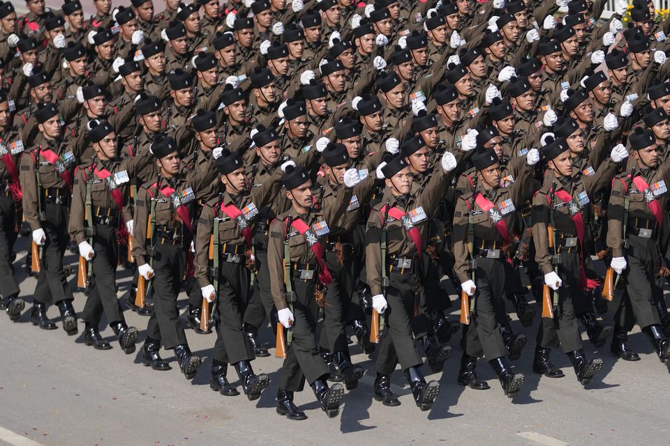 Soldiers marched in New Delhi (Channi Anand/AP)