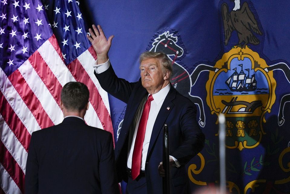 Republican presidential candidate former president Donald Trump waves to supporters after speaking at a campaign rally in Harrisburg, Pennsylvania (Matt Rourke/AP)