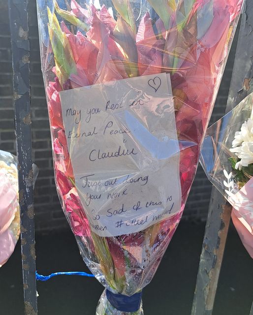 Floral tributes left the scene (Matthew Gibson/PA)