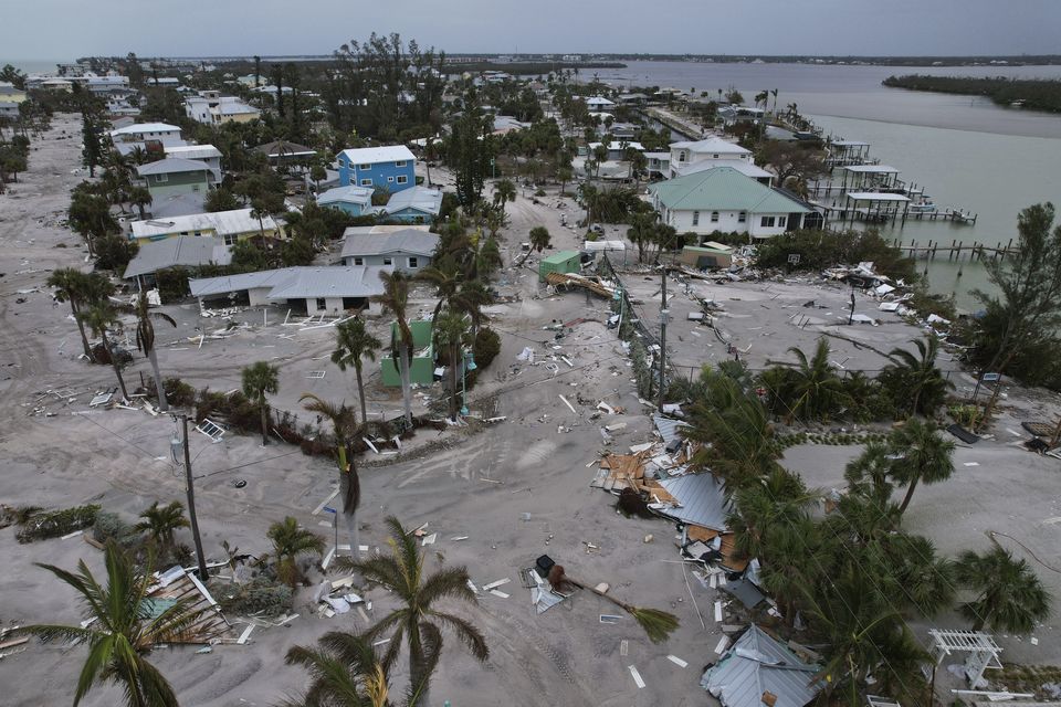 Debris lies scattered on Manasota Key, Florida, following the passage of Hurricane Milton (Rebecca Blackwell/AP)