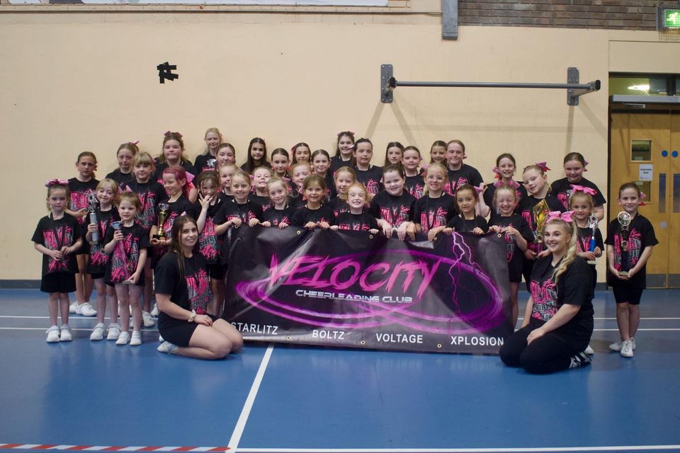 Velocity Cheerleading Club, with (L) Danielle Wilson and (R) Sasha Largey