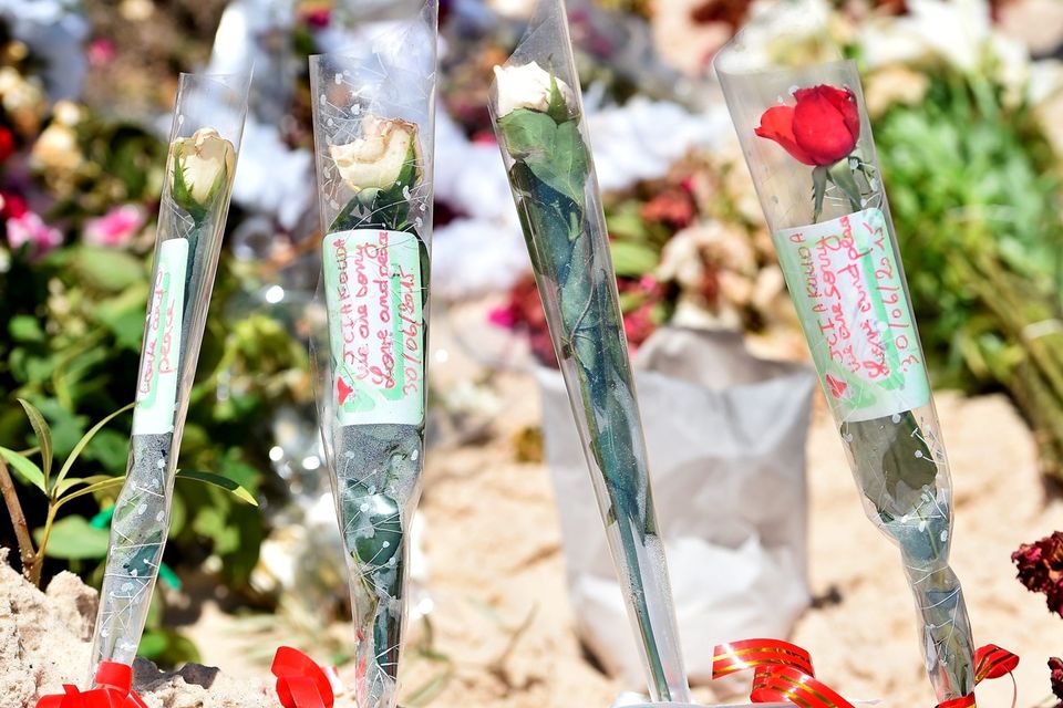 SOUSSE, TUNISIA - JUNE 30:  Flowers are placed on Marhaba beach, where 38 people were killed in a terrorist attack last Friday, on June 30, 2015 in Sousse, Tunisia. British police have been deployed to the area as part of one of the biggest counter terror operations since the London bombings on July 7, 2005. (Photo by Jeff J Mitchell/Getty Images)