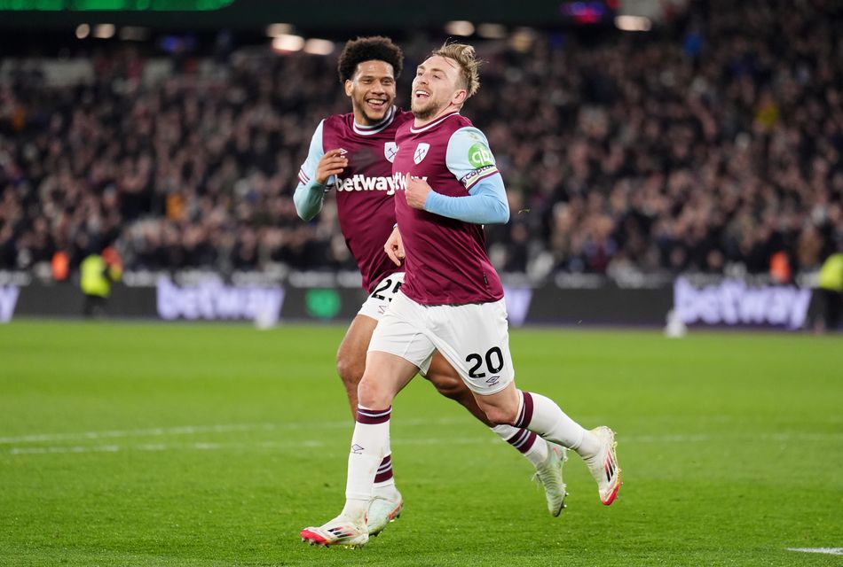 Jarrod Bowen, right, celebrates West Ham’s second goal (PA)