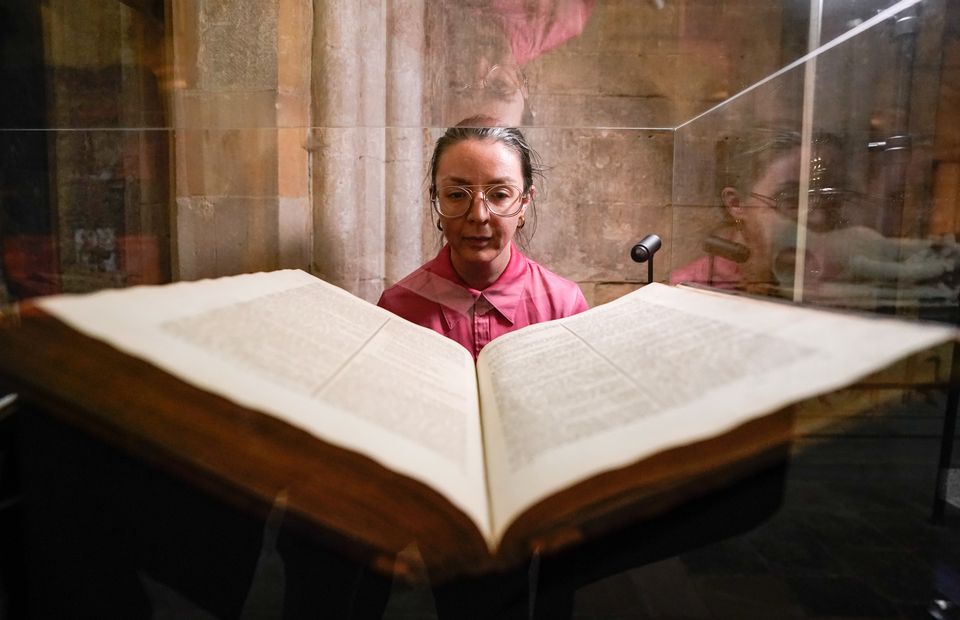 Rebecca Lewry-Gray, visitor experience manager at Chichester Cathedral, during a preview for the exhibition celebrating the cathedral’s 950th anniversary (Andrew Matthews/PA)