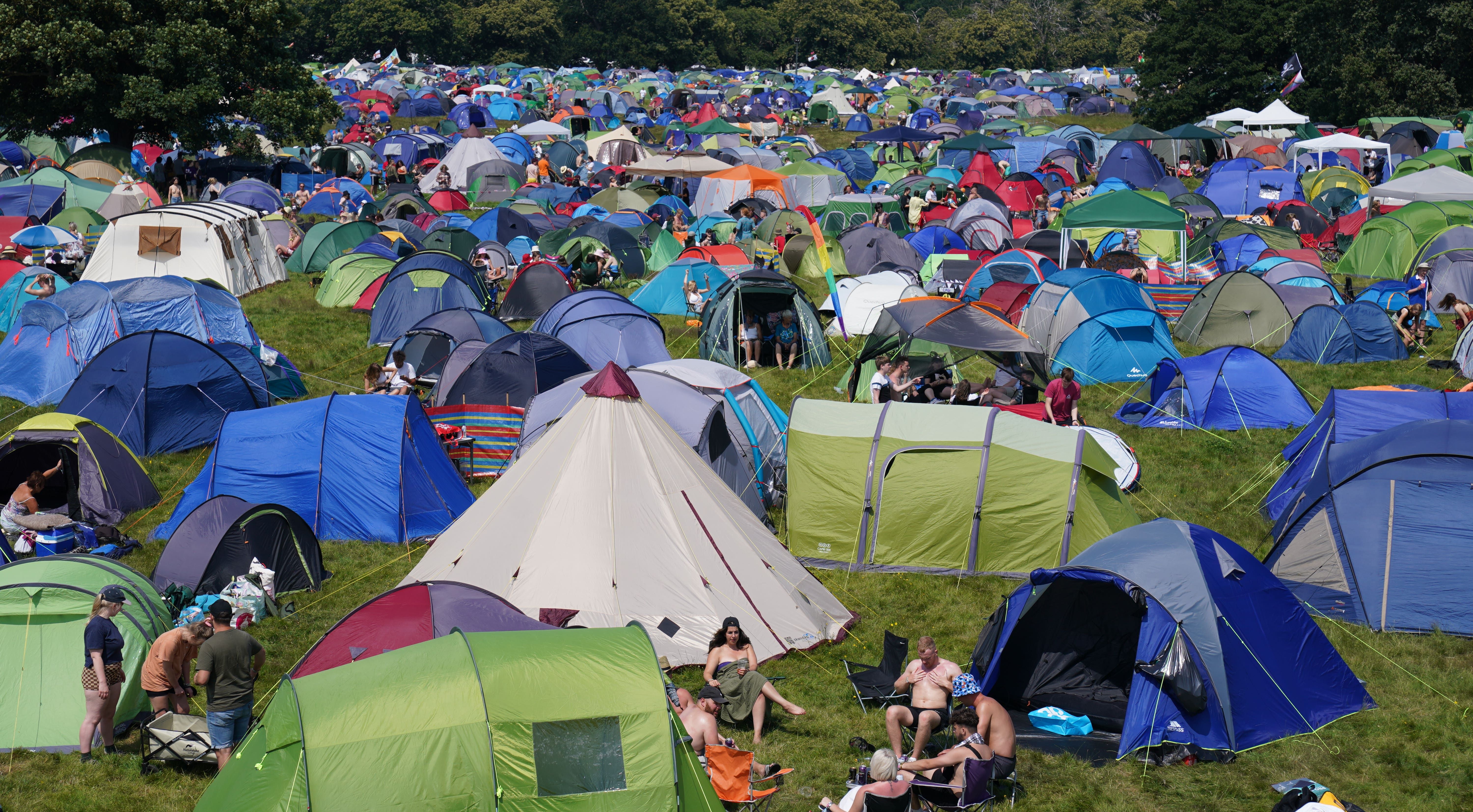 Music fans arrive at Latitude Festival amid heatwave . uk