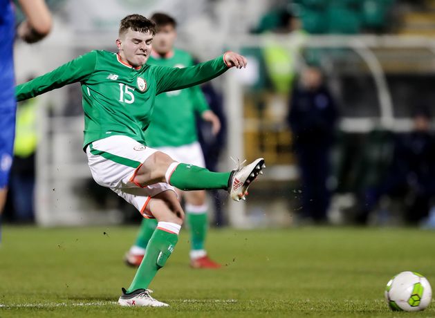 He hasn’t got clearance but we are watching Ronan Hale as if he is our player, says Michael O’Neill