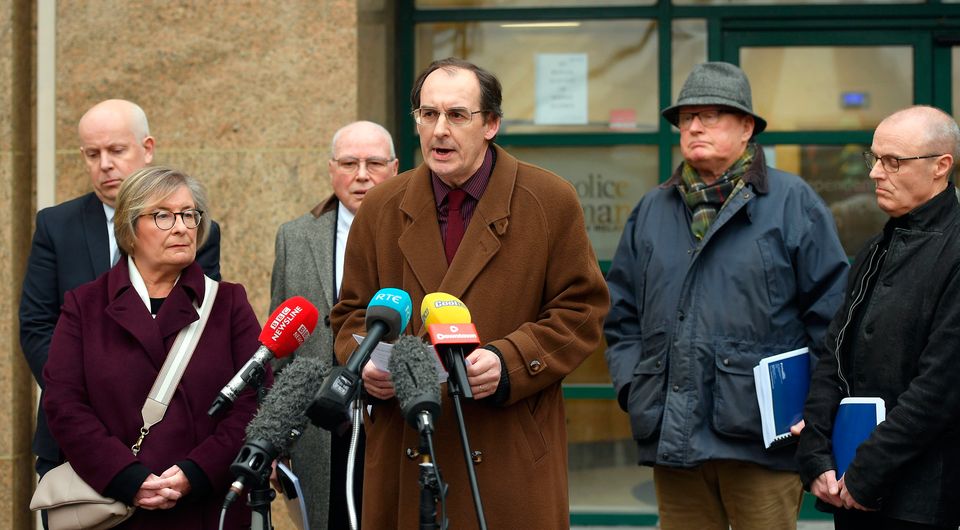 Axel Schmidt, UHRW Advocacy Service Manager, speaks to the media along with families, friends, and campaigners outside the office of the Police Ombudsman for Northern Ireland. Image: Oliver McVeigh/PA Wire