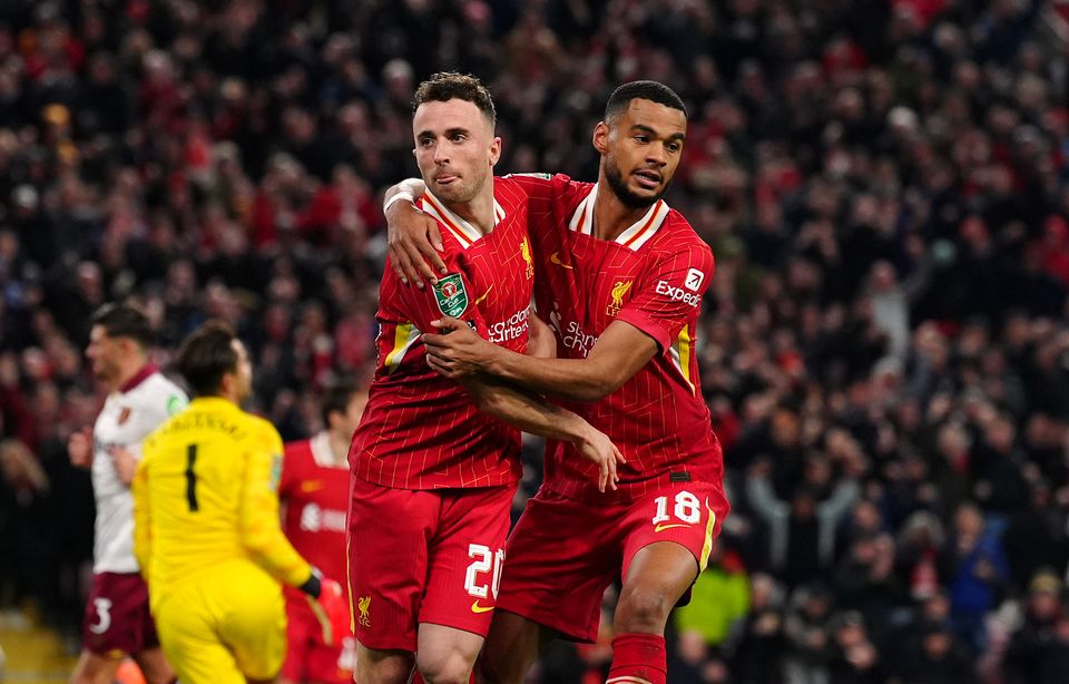 Jota and Cody Gakpo, right, both scored braces at Anfield (Peter Byrne/PA)