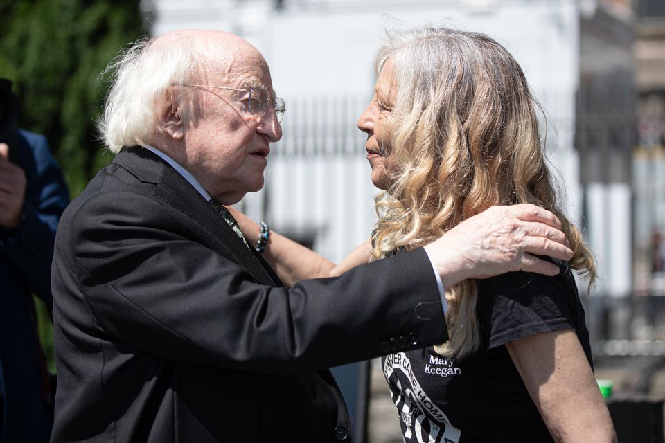 President of Ireland Michael D Higgins with Stardust survivor and campaigner Antoinette Keegan (PA)