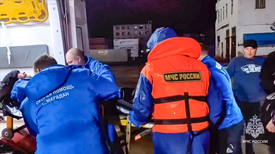 Russian emergency workers transfer Mikhail Pichugin into an ambulance after he was rescued by a fishing vessel following 67 days adrift in the Sea of Okhotsk (Russian Emergency Ministry Press Service/AP)