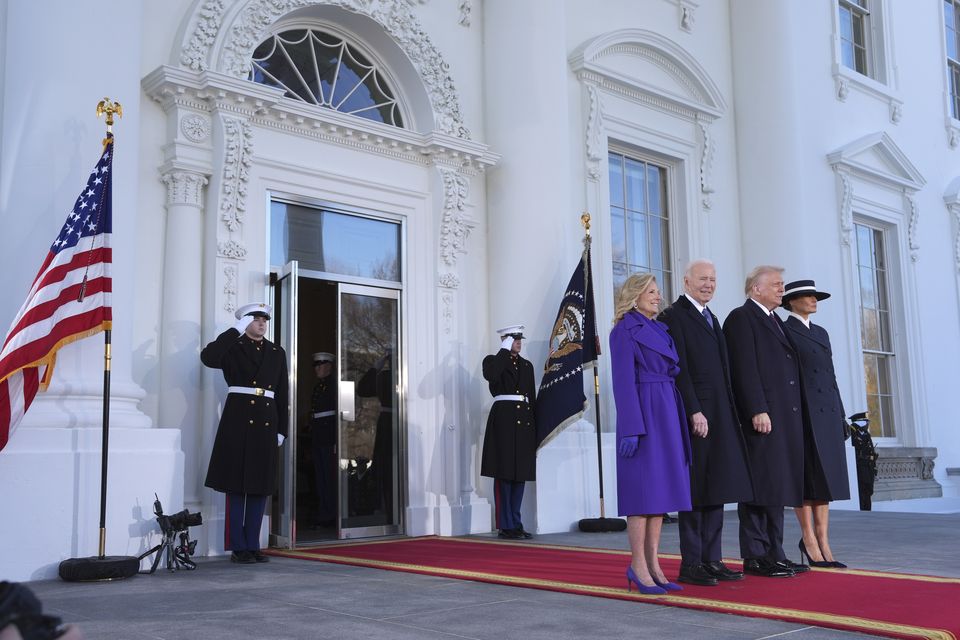 President Joe Biden, centre left, and first lady Jill Biden, left, pose with President-elect Donald Trump, centre right, and Melania Trump, right, upon arriving at the White House in Washington (Evan Vucci/AP)