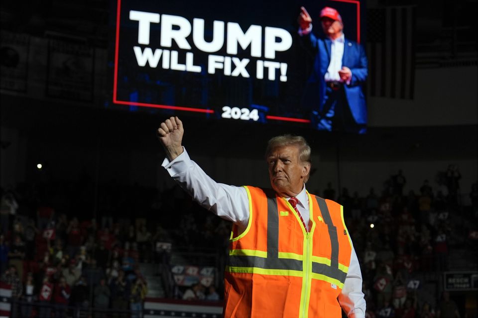 Republican presidential nominee former president Donald Trump gestures after speaking at a campaign rally in Green Bay (Julia Demaree Nikhinson/AP)