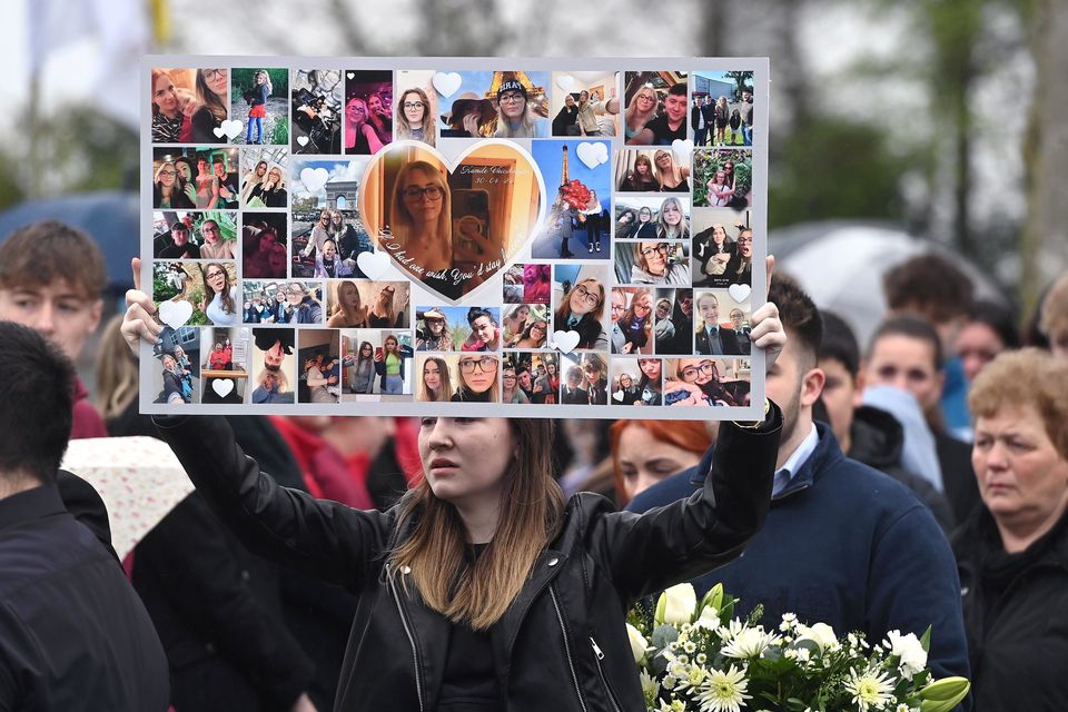 Mourners in Aughnacloy ahead of old Kamile Vaicikonyte’s funeral (Oliver McVeigh/PA)