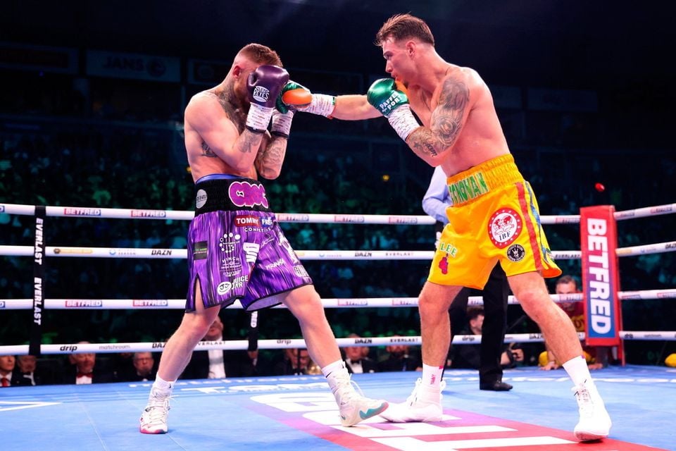 Paddy Donovan lands a punch on Lewis Crocker at the SSE Arena