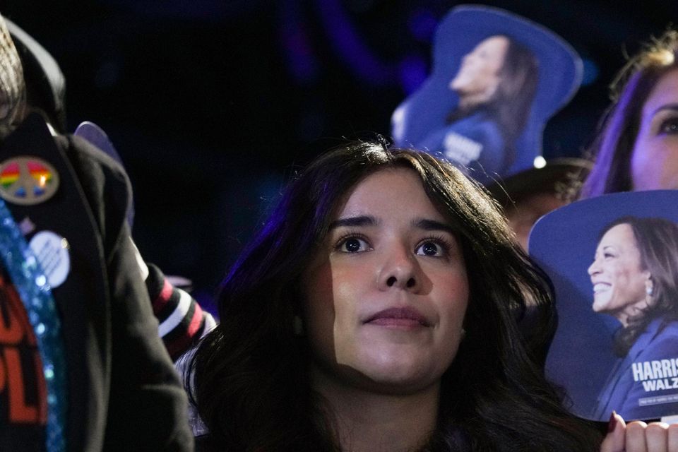 Women listen to Kamala Harris speaking (Susan Walsh/AP)