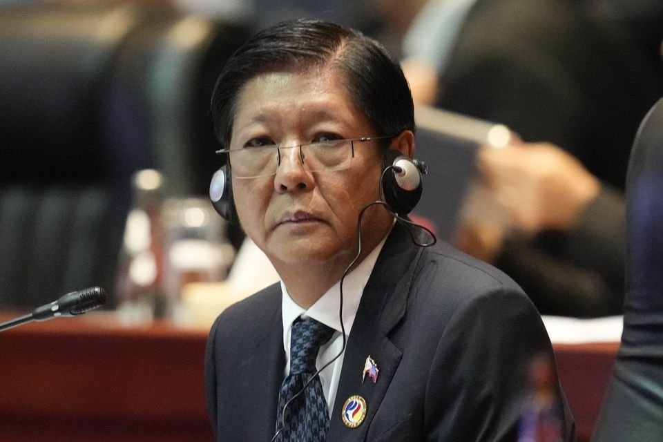 Philippine President Ferdinand Marcos Jr listens during the East Asia Summit in Laos (AP Photo/Sakchai Lalit)