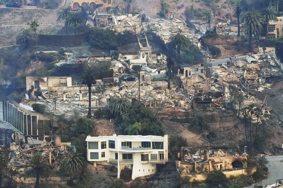 The devastation from the Palisades Fire seen from the air (Mark J Terrill/AP)