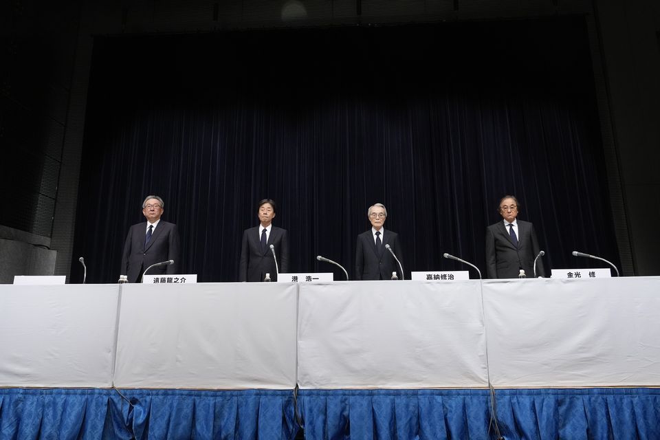 The executives faced the media in Tokyo (AP)