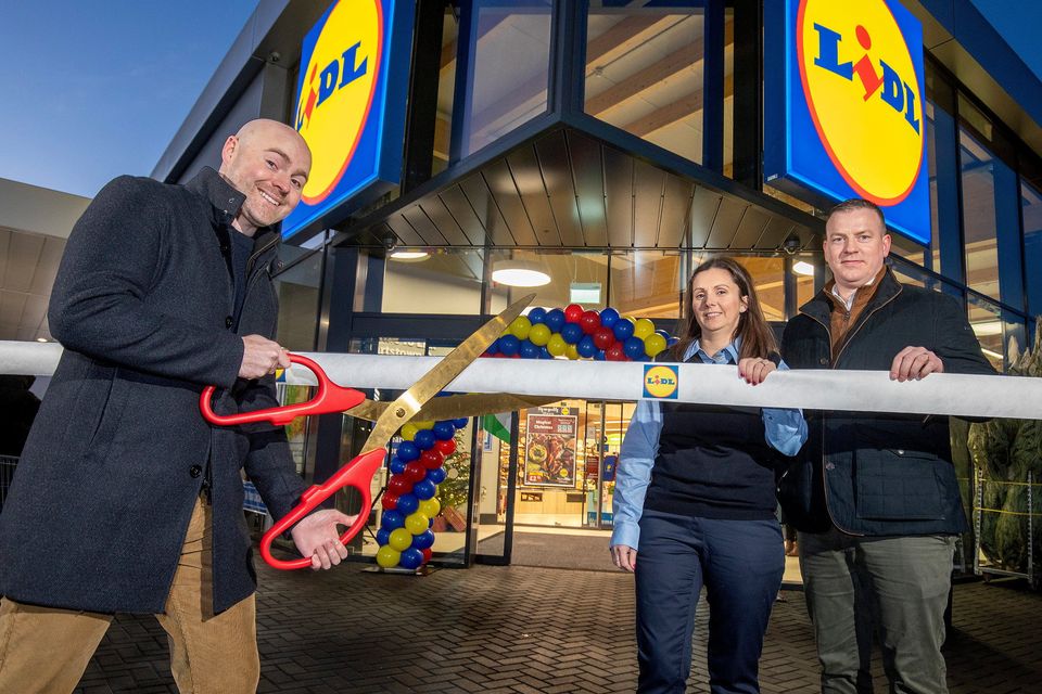 At Lidl NI's refurished Stewartstown Road store (l to r) comedian Paddy Raff, Lidl sales operations director Sarah McKenna, Micheal Long, sales operations manager, Katrina Houston, store manager and Ivan Ryan, Lidl NI regional managing director