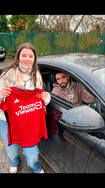 Ava with Man Utd capitain Bruno Fernandes