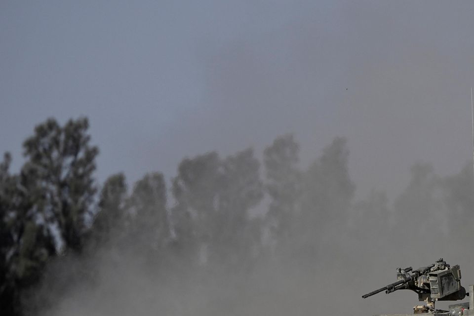 An Israeli tank near the Israel-Gaza border (Tsafrir Abayov/AP)