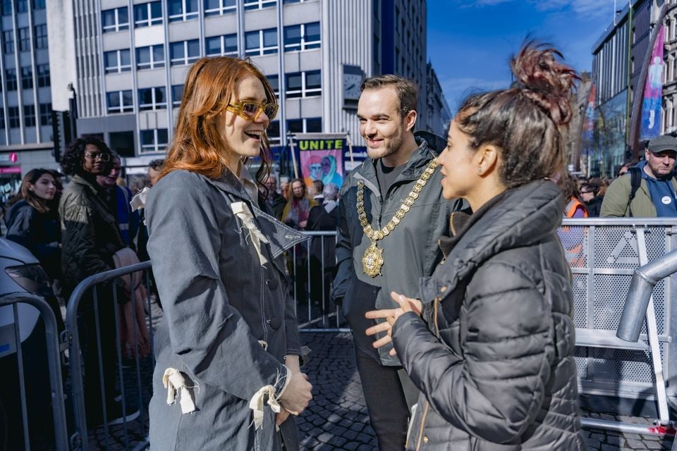 Kate Nash and Lord Mayor Micky Murray meet Sonita Alizadeh as the Reclaim the Agenda International Women’s Day parade takes place in Belfast on March 8th 2025 (Photo by Kevin Scott)
