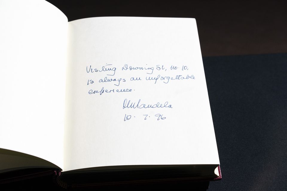 The signature of Nelson Mandela in one of the three Downing Street Visitors Books (Ben Whitley/PA)