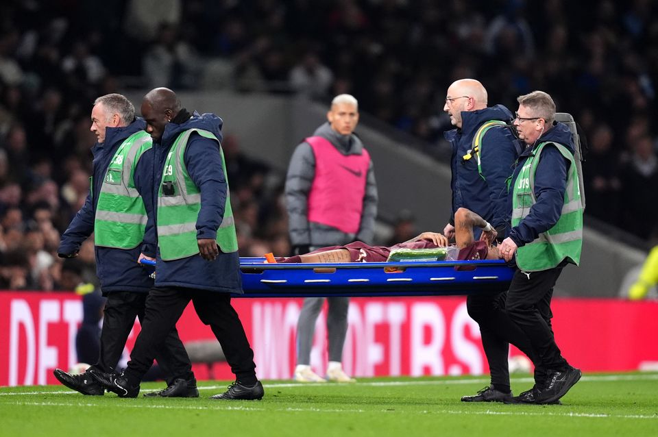 Manchester City winger Savinho went off on a stretcher (John Walton/PA)