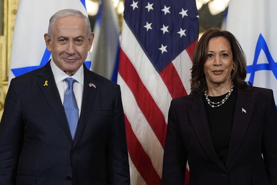 Mr Netanyahu with Vice President Kamala Harris (Julia Nikhinson/AP)