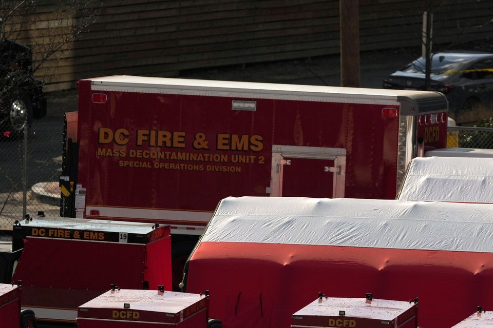 Emergency vehicles and recovery operations near the mouth of the Anacostia River at the Potomac River near Ronald Reagan Washington National Airport on Saturday (Carolyn Kaster/AP)