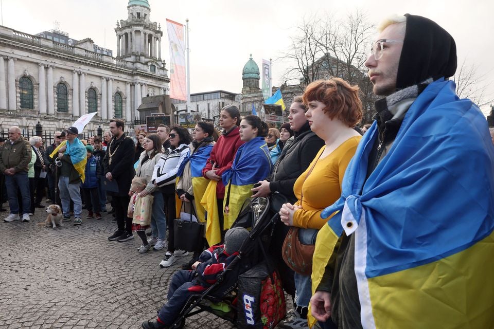 Members of the public, many of them Ukrainian, take part in yesterday’s event at Belfast City Hall