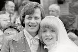 thumbnail: 05-01-1980. Confetti scatters at the wedding of Alex 'Hurricane' Higgins and bride Lynn, at the United Reform church in Wilmslow.