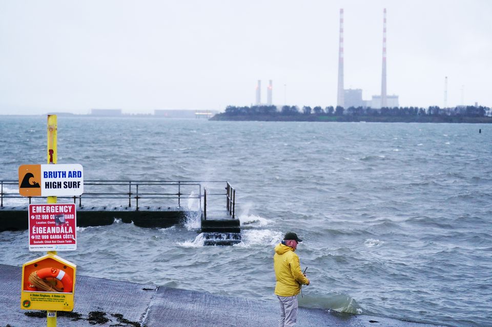 Forecasters said the strongest winds would begin to ease from late morning (Brian Lawless/PA)