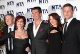 thumbnail: X Factor judges Louis Walsh, Sharon Osbourne, Simon Cowell and Dannii Minogue with the show's presenter Dermot O’Leary (Pic: Steve Parsons)