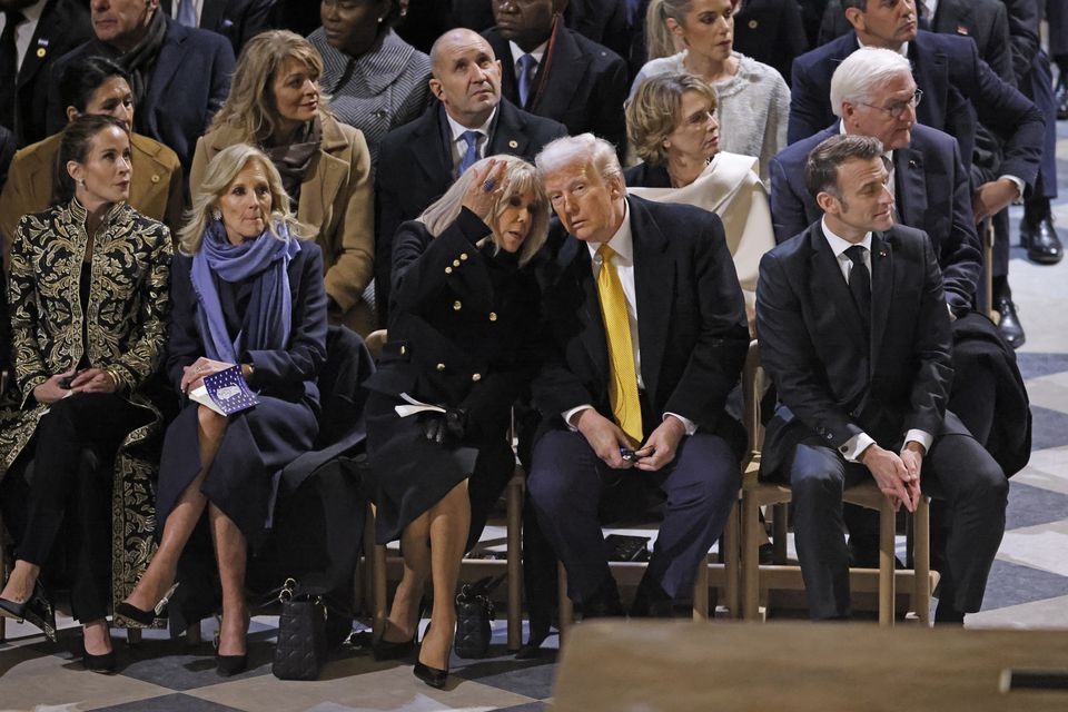 Dignitaries including Donald Trump gather to mark the reopening of the landmark cathedral (Ludovic Marin, Pool via AP)