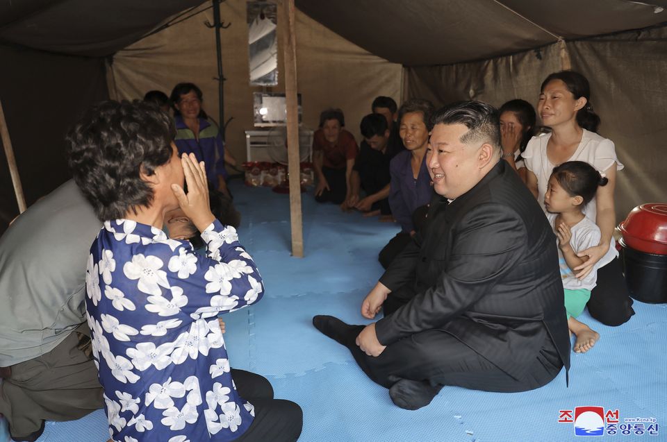 The North Korean leader has been visiting people affecting by flooding (Korean Central News Agency/Korea News Service via AP)