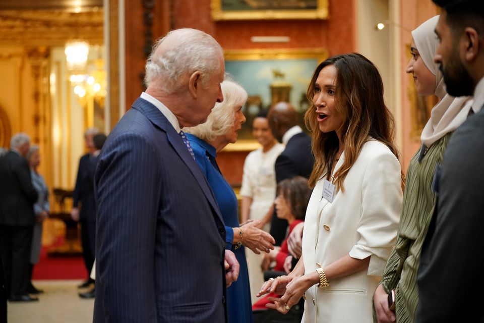 King Charles talks with Myleene Klass during a reception celebrating exceptional individuals and organisations (Yui Mok/PA)