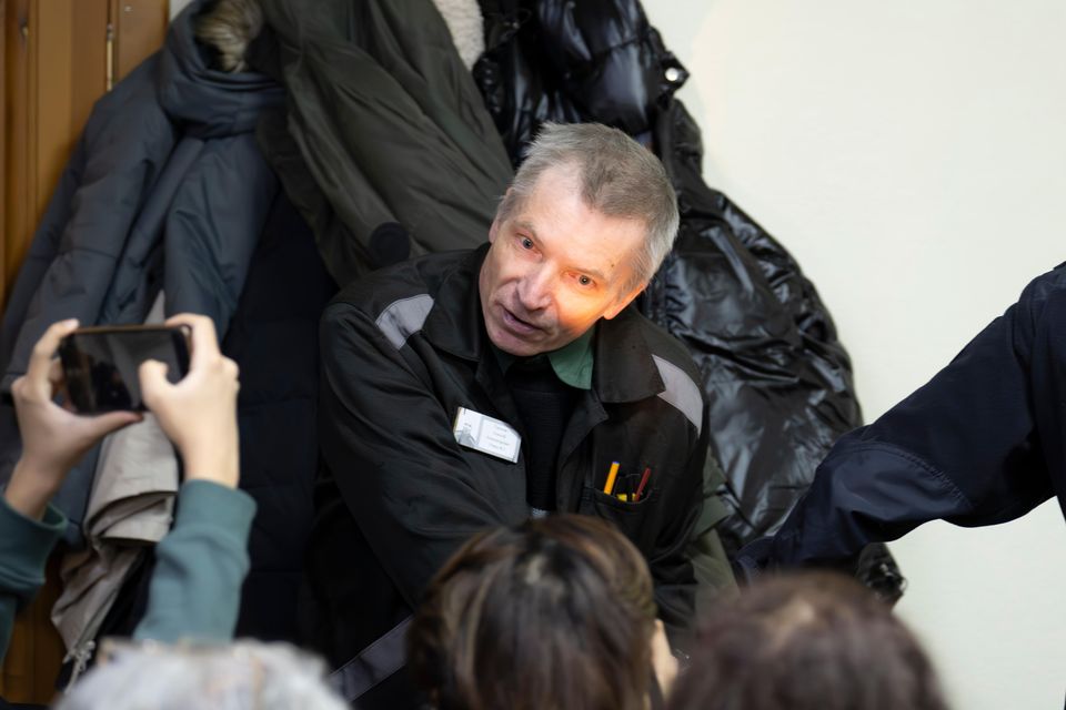 Imprisoned Kremlin critic Alexei Gorinov is escorted to court (Dmitry Serebryakov/AP)